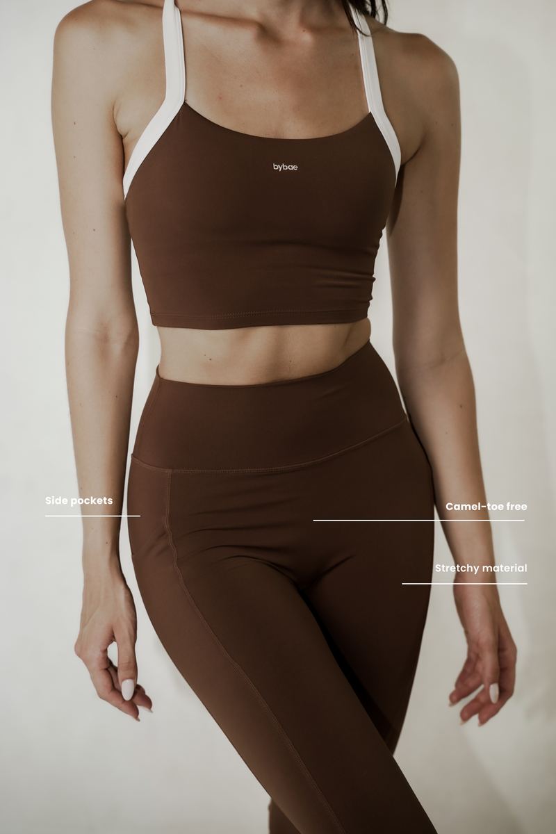 Model wearing sculpting leggings in soft fabric, showing a flattering fit and comfortable stretch for everyday wear.